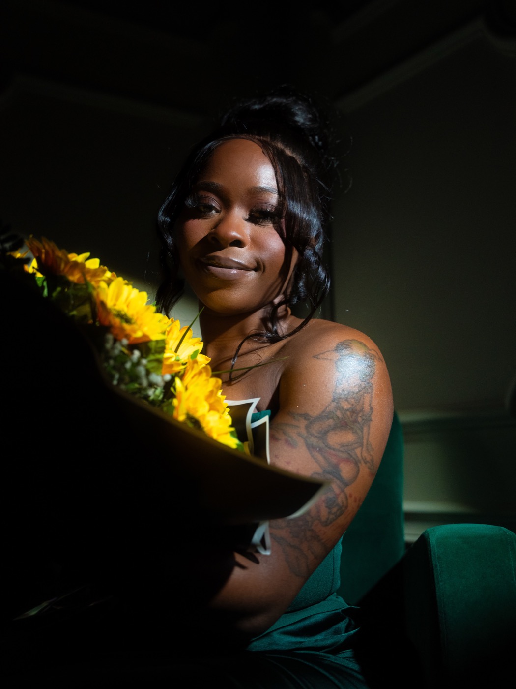 Portrait with a bouquet of sunflowers